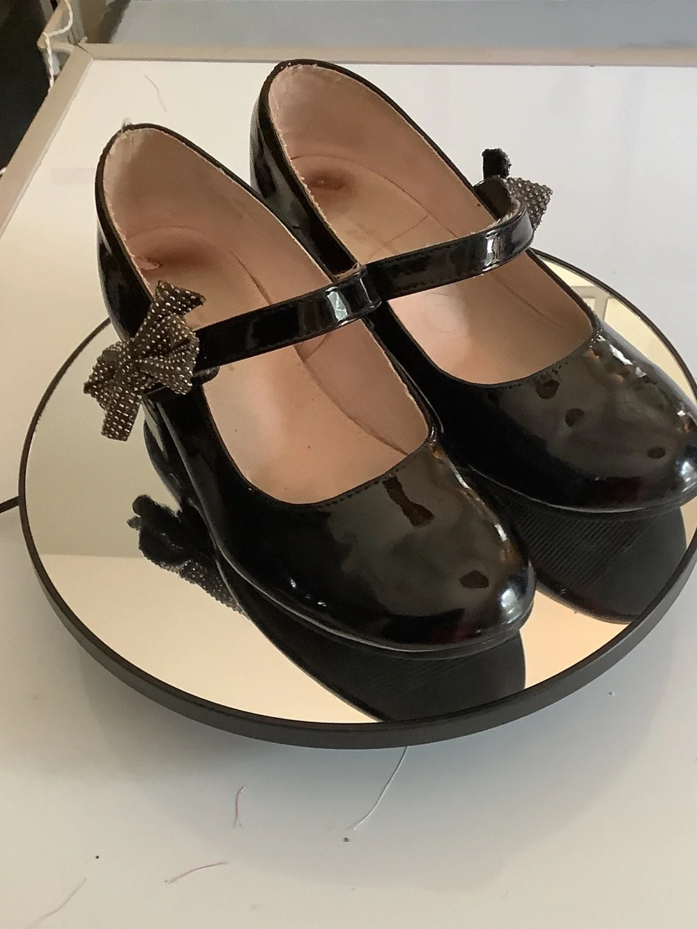 cupcakes & cashmere Black Patent Mary Jane Wedges with Embellished Bow